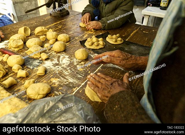 TLAXCALA, MEXICO . OCTOBER 28: A baker during the preparation of the traditional bread of the dead ( Pan de Muerto). Inhabitants of the community of San Esteban...