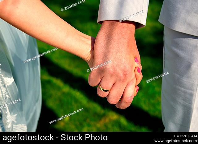 wedding couple hand in hand