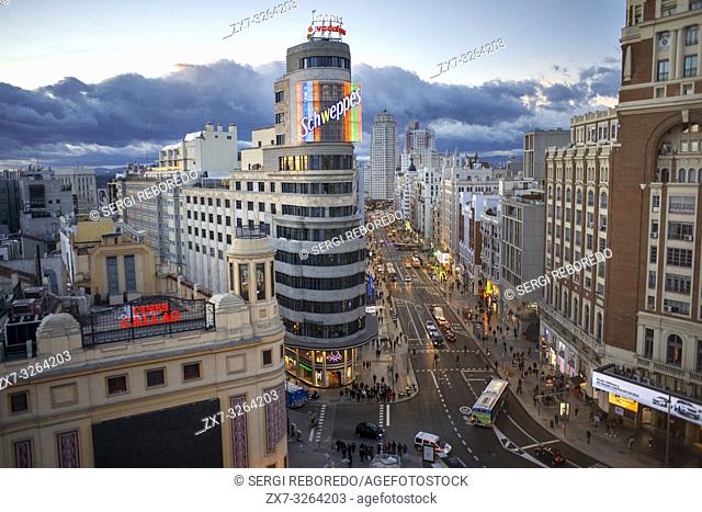 Capitol building, Gran Via at the Iconic Schweppes Building. The street is the main shopping district of Madrid, Spain