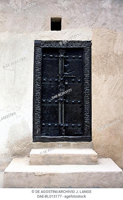 Carved wooden door, Al Qasimi Fort in Ras al-Khaimah City, now the National Museum of Ras al-Khaimah, United Arab Emirates