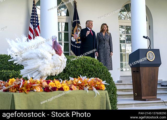 United States President Donald J. Trump and First Lady Melania Trump depart a ceremony after pardoning Corn, the National Thanksgiving Turkey