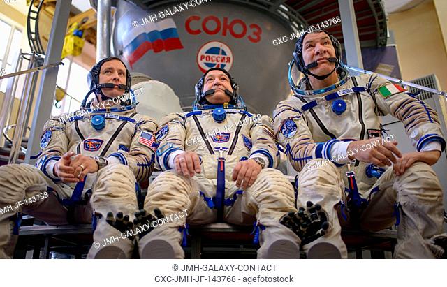 Expedition 50 backup crew members, NASA astronaut Jack Fischer, left, Russian cosmonaut Fyodor Yurchikhin of Roscosmos, center, and ESA astronaut Paolo Nespoli