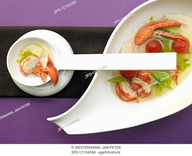 Clear lobster soup with leek and tomatoes