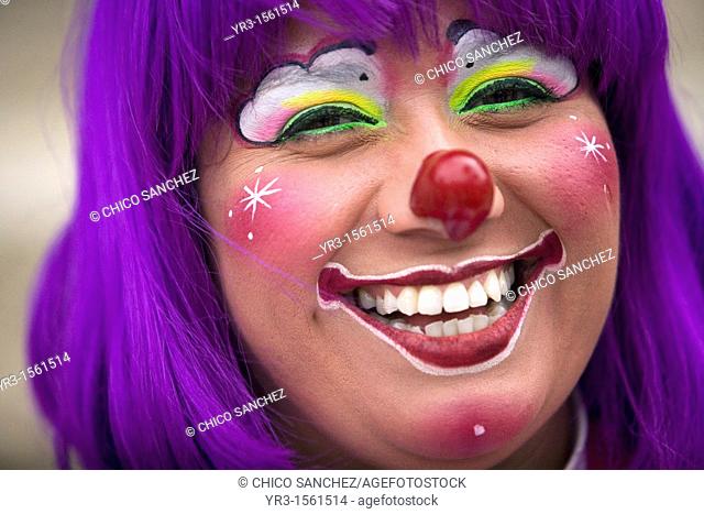 A female clown smiles during the 16th International Clown Convention: The Laughter Fair organized by the Latino Clown Brotherhood, in Mexico City, October 17