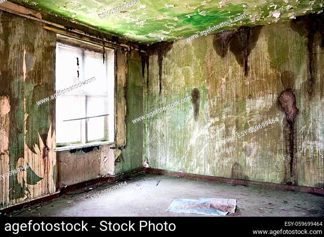 old leave deserted room with window, grunge and dirtiness wall