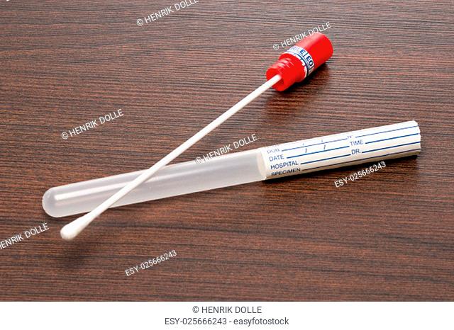 dna test tube and cotton swab, wipe test