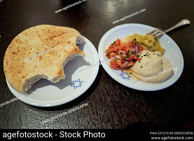 14 December 2023, Berlin: Dishes with the Star of David can be seen on a table at the Jewish Community Day 2023 at the Intercontinental Hotel