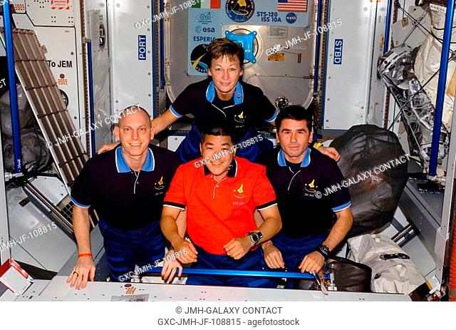 Astronauts Peggy A. Whitson, Expedition 16 commander; Clayton Anderson (left), STS-120 mission specialist; Daniel Tani, ISS flight engineer; and cosmonaut Yuri...