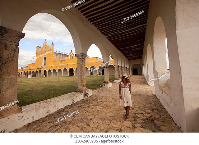 Woman posing at Izamal convent, Monastery-Convent Of San Antonio De Padua, Izamal, Yucatan, Yucatan Province, Mexico, Central America