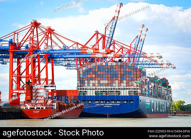01 September 2022, Hamburg: The container ship ""Jacques Saade"" of the shipping company CMA CGM is moored at the container terminal Eurogate in the Port of...