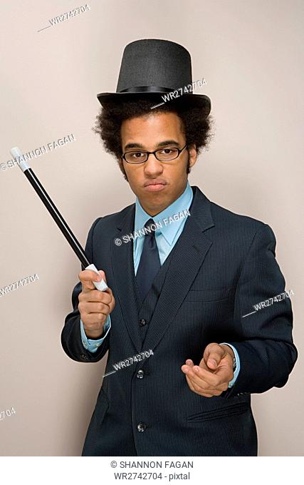 Businessman dressed as magician