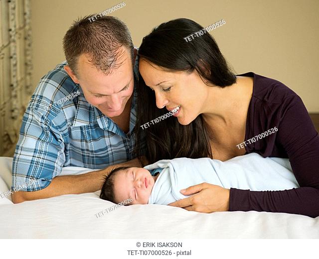 Portrait of family with newborn baby boy (0-11 months)