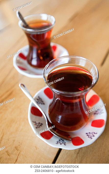 Traditional Turkish tea cups on the table in Grand Bazaar, Sultanahmet, Istanbul, Turkey,