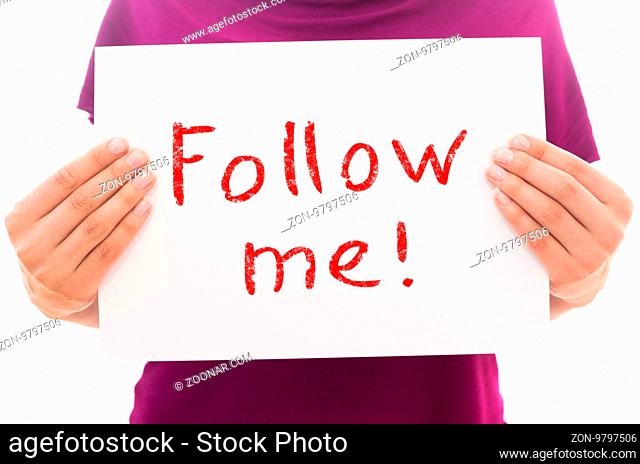 Girl holding white paper sheet with text Follow me