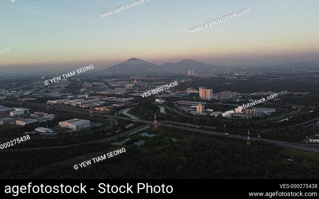 Aerial view sunset beautiful soft color sky of Bukit Minyak Industrial Park beside PLUS highway