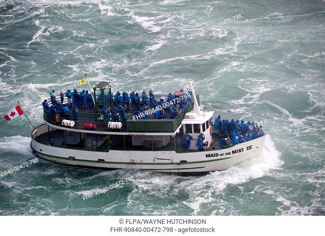 'Maid of the Mist' tour boat with tourists viewing waterfall, Horseshoe Falls, Niagara Falls, Niagara River, Ontario, Canada, august