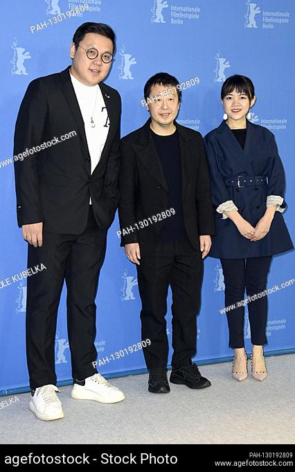 Wan Jia Huan, Zhangke Jia / Jia Zhang-ke and Zhu Weijie at the photocall for 'Yi zhi you dao hai shui bian lan / Swimming Out Till the Sea Turns Blue' at the...