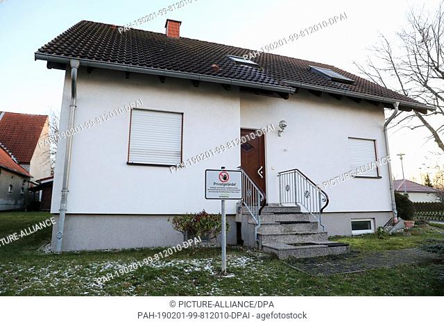 29 January 2019, Saxony, Pödelwitz: A sign of the Mibrag warns at a single family house against entering private premises