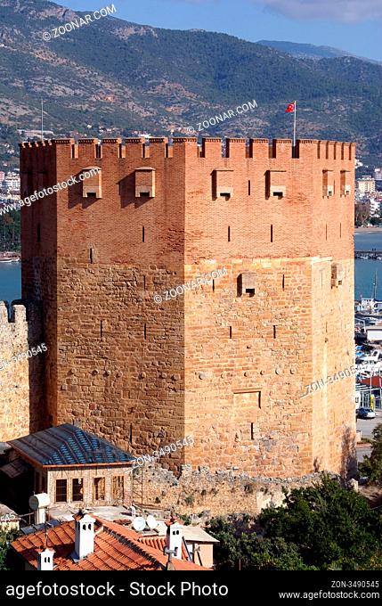 Red tower and houses in Alanya, Turkey