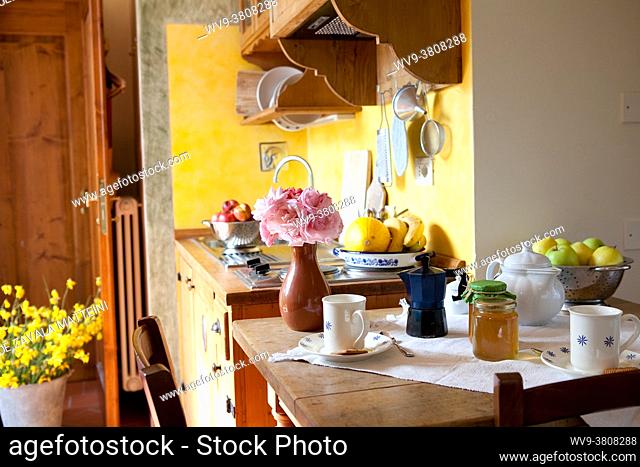 A table finely set for breakfast in a rustic decoration