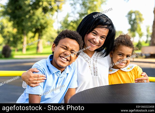 Beautiful happy african american family bonding at the park - Black family having fun outdoors, proud grandma with her grandchild