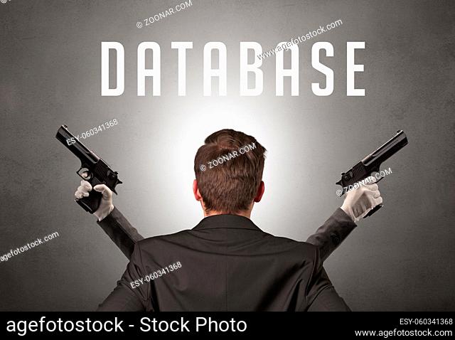 Rear view of a businessman with DATABASE inscription, cyber security concept