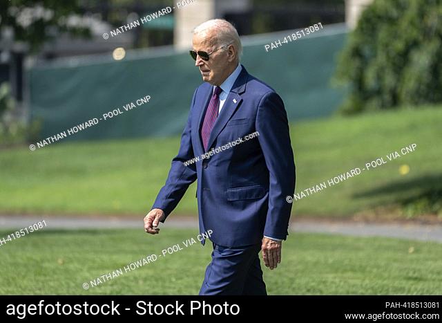 United States President Joe Biden walks on the South Lawn of the White House before boarding Maine One in Washington, DC, US, on Friday, July 28, 2023