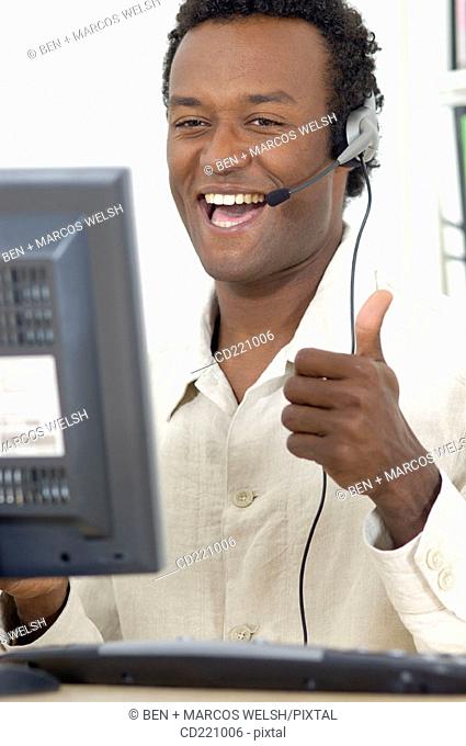 Black man, telemarketing, happy