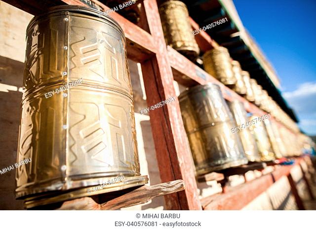 Spinning Buddhist prayer drums at a monastery in Mongolia