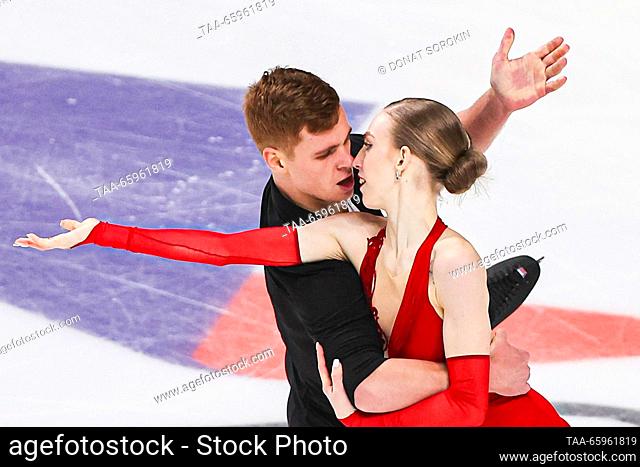 RUSSIA, CHELYABINSK - DECEMBER 21, 2023: Pair skaters Natalya Khabibullina and Ilya Knyazhuk perform during a pairs' short programme event as part of the 2024...