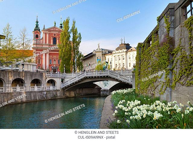 Ljubljana city center, Lublijanaka river, Tromostovje bridge and Franciscan Church of the Annunciation, Slovenia