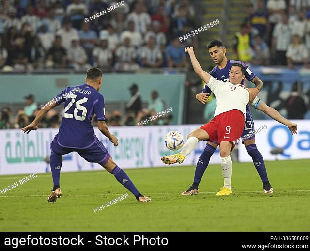 11/30/2022, Stadium 974, Doha, QAT, World Cup FIFA 2022, Group C, Poland vs Argentina, in the picture Argentina's defender Nahuel Molina Poland's forward Robert...