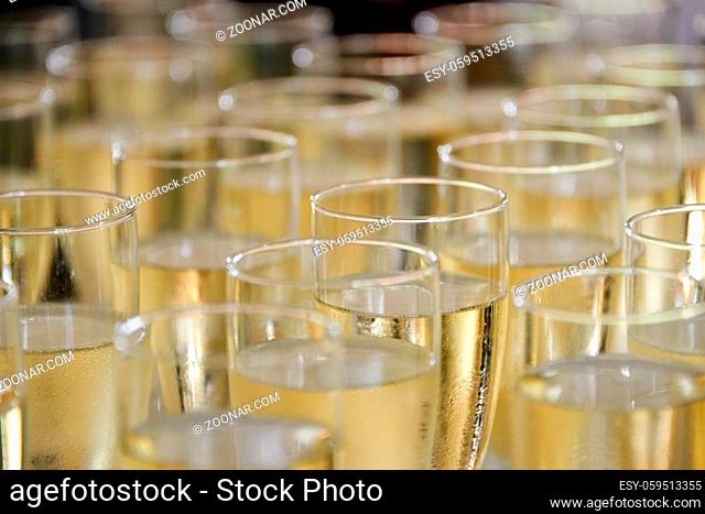 filled champagne glasses
