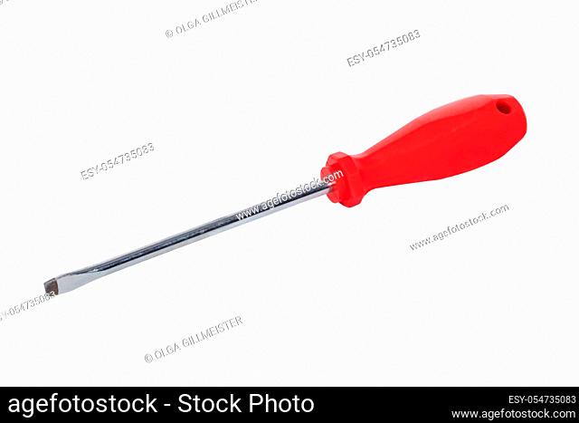 Closeup of a screwdriver with red handle isolated on white background. Macro photograph