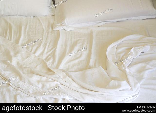 Great concept of bed messy, unkempt, white bed, crumpled sheet