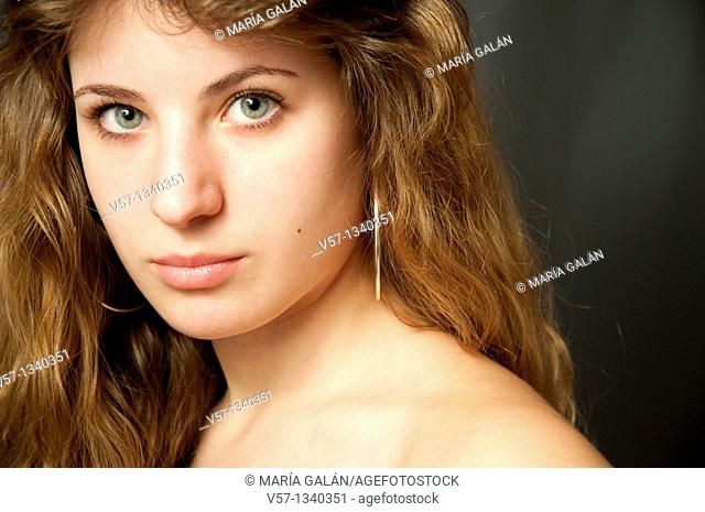 Portrait of young woman looking at the camera. Close view