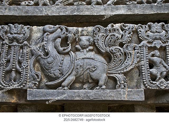 Sculpture of the mythical beast Makara, which is a mystical animal composed of Peacock, Elephant, Lion, Pig and Crocodile, at the base of temple
