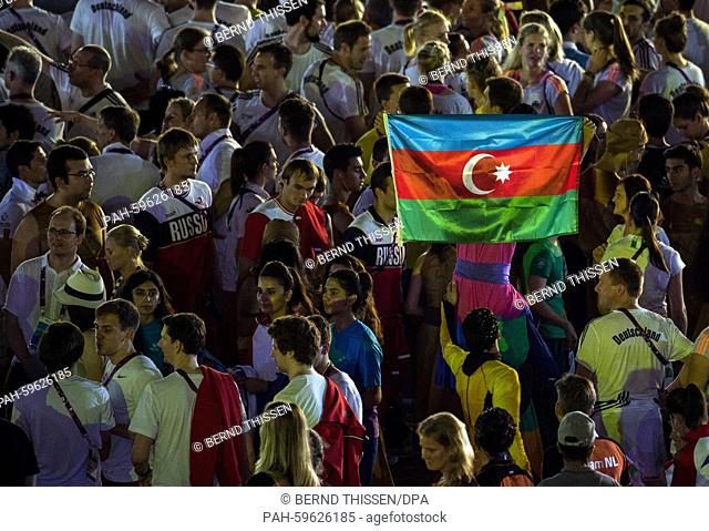 An Azerbaijanian flag is seen while athletes of different nations participate in the Closing Ceremony at the Baku 2015 European Games in Baku, Azerbaijan