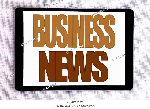 Hand writing text caption inspiration showing Business News. Business concept for Modern Online News written on tablet screen on white background
