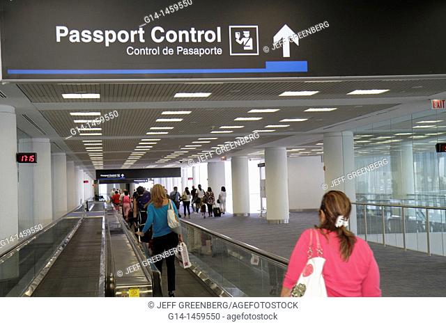Florida, Miami, Miami International Airport, MIA, arriving passengers, international flight, concourse, passport control, moving sidewalk