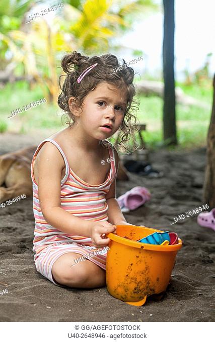 3 year old girl at the beach