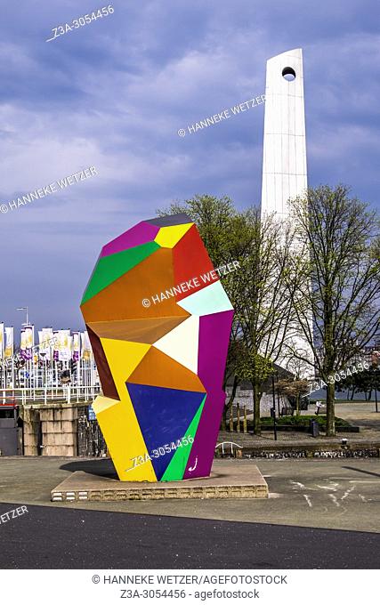 Colorful sculpture named â. . Marathonâ. . near the Erasmus bridge in Rotterdam. It is made by artist Henk Visch in 2000 and consists of bright, angular planes