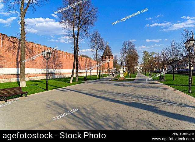 A small park between the wall of the Tula Kremlin and Mendeleevskaya street. View of the monument to Karl Marx and the Nikitsky Tower