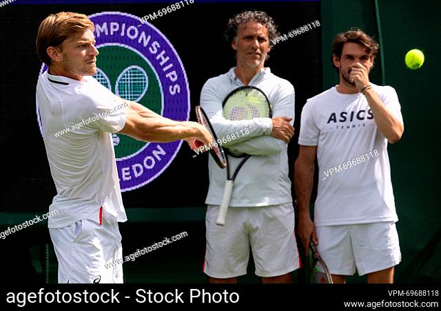 Belgian David Goffin, Goffin's coach Yannis Demeroutis and Goffin's coach Germain Gigounon pictured during a training session ahead of the 2023 Wimbledon grand...