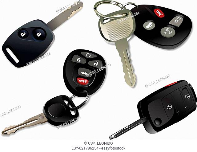 Four Car keys with remote control isolated over white background