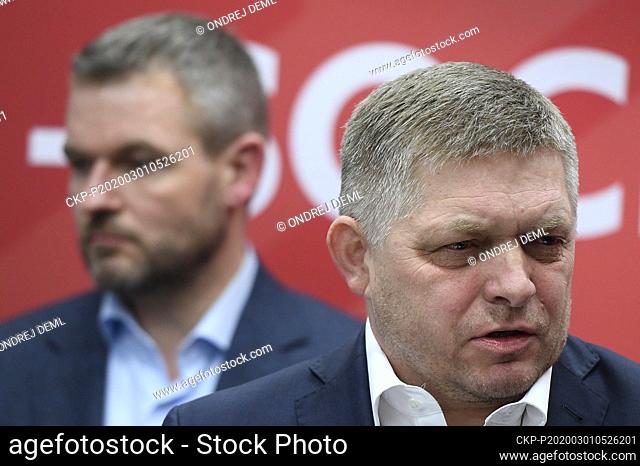 Former Slovak prime minister Robert Fico, right, does not intend to step down as the leader of the strongest government coalition party