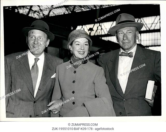 Oct. 10, 1955 - Rosalind Russell And Husband Arrive: Popular film star Rosalind Russell arrived at Waterloo this morning in the Queen Elizabeth boat-train