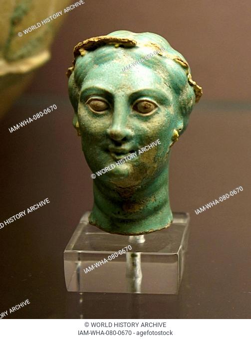 Faience head of Arsinoe II from Naukratis, Egypt. Dated 3rd Century BC