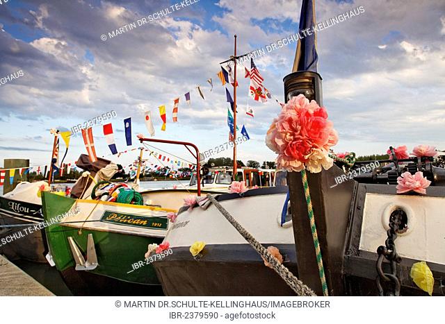 Boats decorated for the 42nd Pardon de marines, pilgrimage of the boatmen on the Saône and its banks, Saint-Jean-de-Losne, Dijon, Burgundy, Côte d'Or department