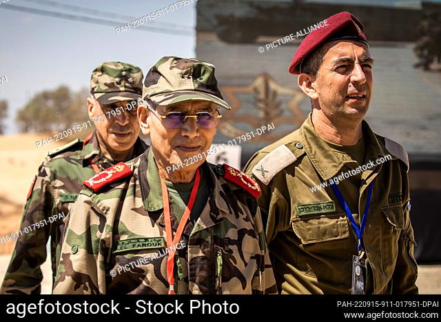 15 September 2022, Israel, Tze'elim: Inspector general of the royal armed forces of Morocco Lieutenant General Belkhir El Farouk (C) attends the live-fire...